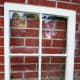 Start with an old window. Clean and prep it so that you can paint the frame.
