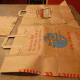 cutting the paper bag bottom off