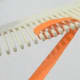Wrap paper around the next two prongs.