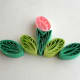 A quilled design with comb quilled coils.