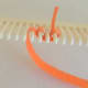 Wrap around and under the next prong.