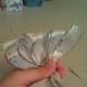 All the loops are made and twisted and there is a few inches left at the end of the ribbon.