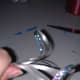 Cut the looped ends to make then single strands