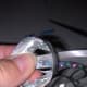 Tie all strands together in a knot in the center.