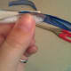 Put the two ends of the different colored ribbon together