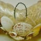 Closeup of wire inserted into wreath and wrapped around to make a secure hanging hook.