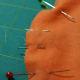 2. Use small pins to mark where pieces are that will be sticking out, like legs and arms.