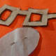 3. Pin the pattern pieces to the right side of the toy body. Note the hash mark at the top of the nose that matches up with the bottom of the eyeglasses.