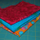 With a fun pattern, these jewel tones give the mug rug a rich feel.