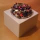 Simple foil confetti adorns this K-cup Barbie hat