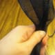 Every turn or so, sew a few stitches to help keep everything in place.