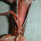 Your first stitch should have both ends (1 long and 1 short) inside the leather, so that you can tie a knot to secure them.