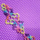 A lovely multicolored sample of tatting.