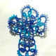 Blue tatted bookmark.
