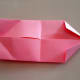 Make a second fold along the crease lines with each right corner.
