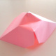 Push the top of the paper downwards to make a small indentation.