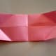 Unfold all the corners to reveal the crease lines.