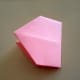 Follow the vertical crease line and fold the paper in half again.