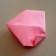 Let's continue making the origami heart. Make a small triangle on the lower right corner.