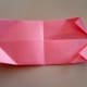 Fold both corners on the right again to align their edges with the diagonal crease lines.