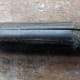 On noticing a metal rod at the tip I realised it was more than just an old stick.
