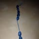 As you take a shot you move one bead down, keeping count with ease