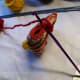 Insert the crochet hook at the back of the head.