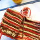 Sew down the neck and then the back.