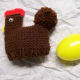 Used a worsted weight yarn for body in a solid color. (Plastic egg fits inside underneath.)