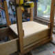 Using the drawer sides as a jig for fixing the supports for the drawer support shelf.
