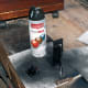 Latch painted with black spray paint