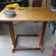 Rubbing in and buffing up bees wax on the table