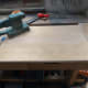 Sanding smooth the newley made teak table top