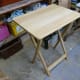 The original folding pine table replaced by the new sofa tables.