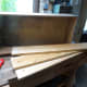 Wood salvaged for recycling in DIY projects.