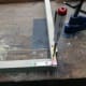 Using a bradawl to start the holes for screwing.