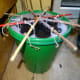 Bucket mould placed into a 2nd bucket to capture any was that initially leaks out the bottom.