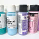Pictured here are a few bottles of craft acrylic paint.