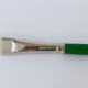 A normal paintbrush like this can also be used to apply gesso.
