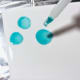Dropping ink onto a ceramic tile