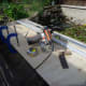 Measuring and cutting required plywood from an old garden shed door.