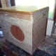 Using wood filler to fill unwanted imperfections in the recycled wood.