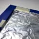 An example of how to cover the back of a stretched canvas. This works best when the foil is flat against back of the canvas.