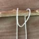 Pull the loop over the driftwood.