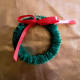 Add a little bow on wreath.