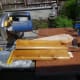 Cutting the two inner shelf supports from spare wood recycled from the redundant pine table used to make shelving in the office alcove.