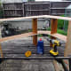 Gluing and screwing the top shelf in place.