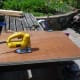 Using a jig saw to cut the shelves to shape, including the curve.