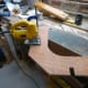 Cutting out the corresponding joints in the middle shelf.