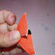 Fold one side up and down again.